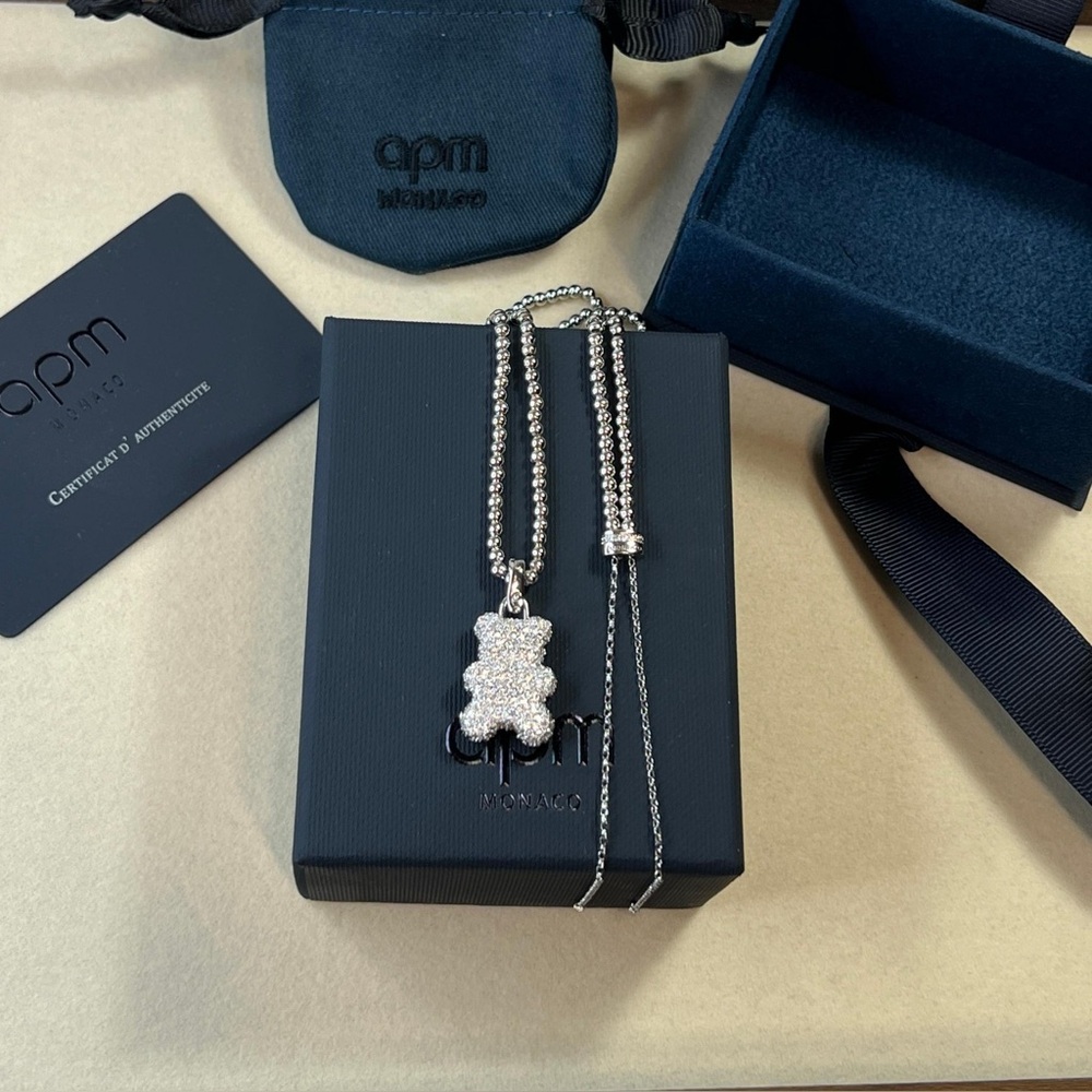 APM Monaco black and white double-sided bear necklace